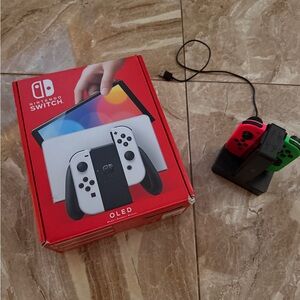 Nintendo Switch OLED with White and extra remotes and charger
